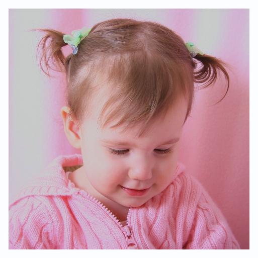 I think this is my favorite from the shoot.  I don't really like pink, but our little girl looks so beautiful in it.