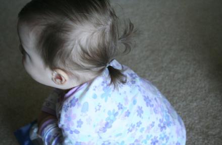 Like I said, finally able to put stuff in her hair, although she usually doesn't let us keep it in for very long.  These two pictures are the exception.