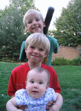 Audrey with Travis and Daniel.